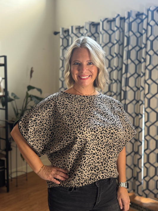 Animal print jacquard knit zipper sleeve top