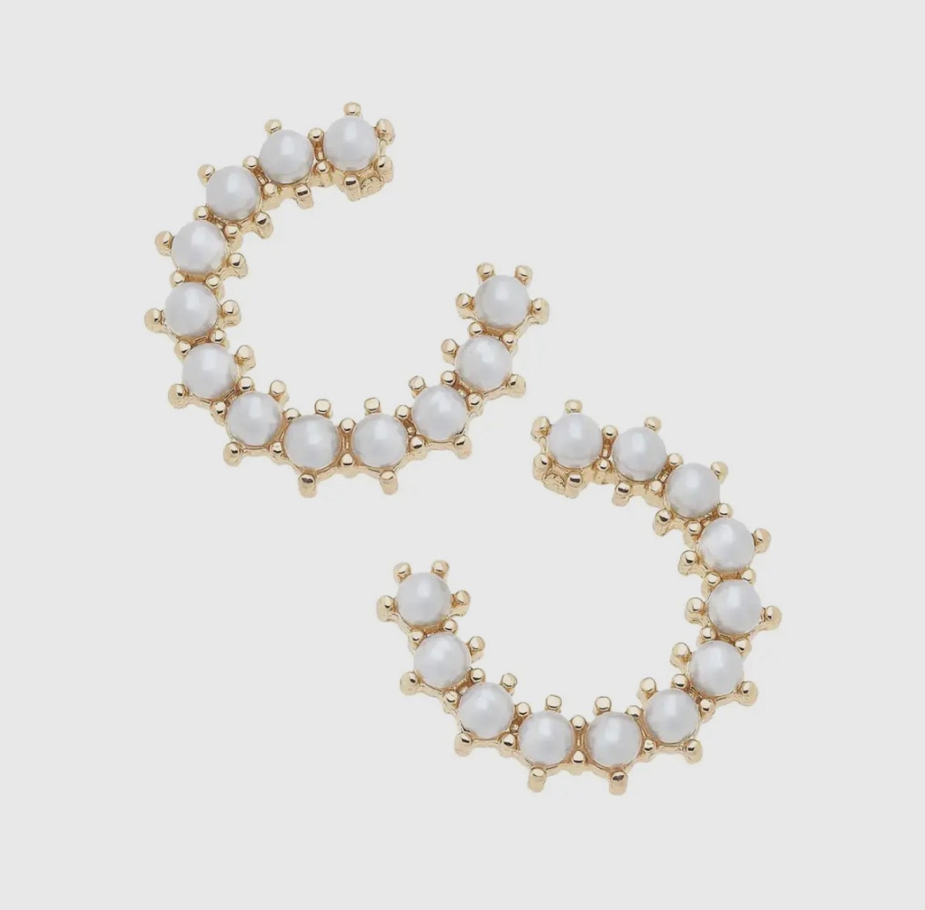 Pearl studded horseshoe earrings